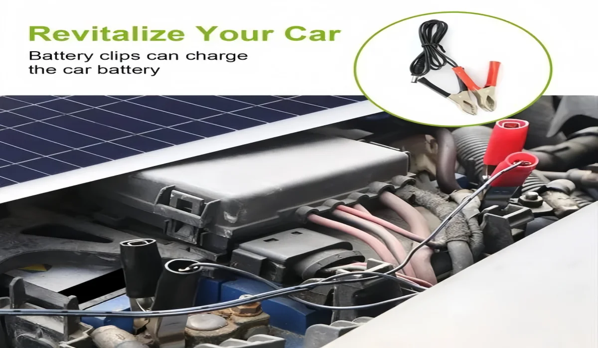 Painel solar port&aacute;til com pin&ccedil;as jacar&eacute; carregando bateria de carro ao ar livre